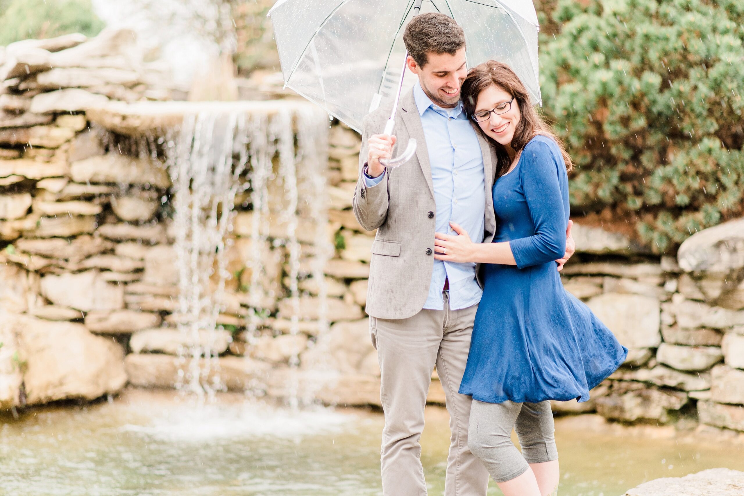 Oliver Winery Engagement Session waterfall rain
